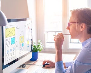 User experience - Woman looking at computer screen
