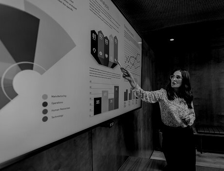 Woman giving a business analysis presentation