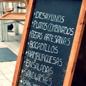 spanish menu on a chalkboard