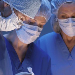 Two nurses and a doctor in the operating room