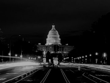 The United States Capitol building at night in Washington DC, USA.