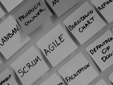 Post-it notes with agile and project management styles listed