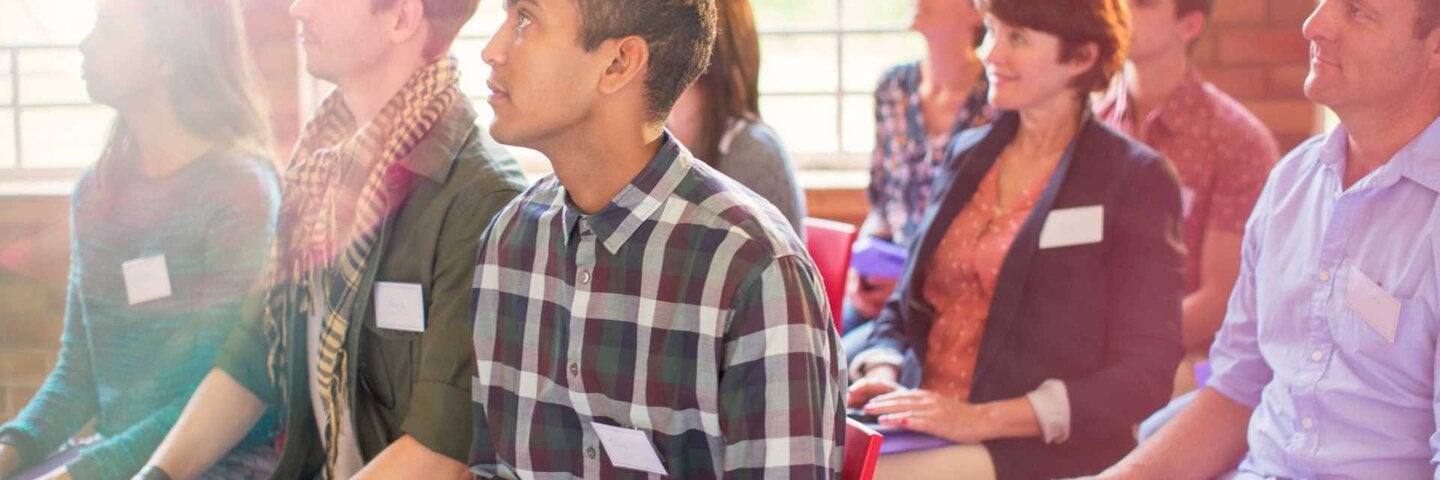 People sitting at an event