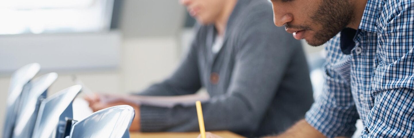 two male writers in classroom