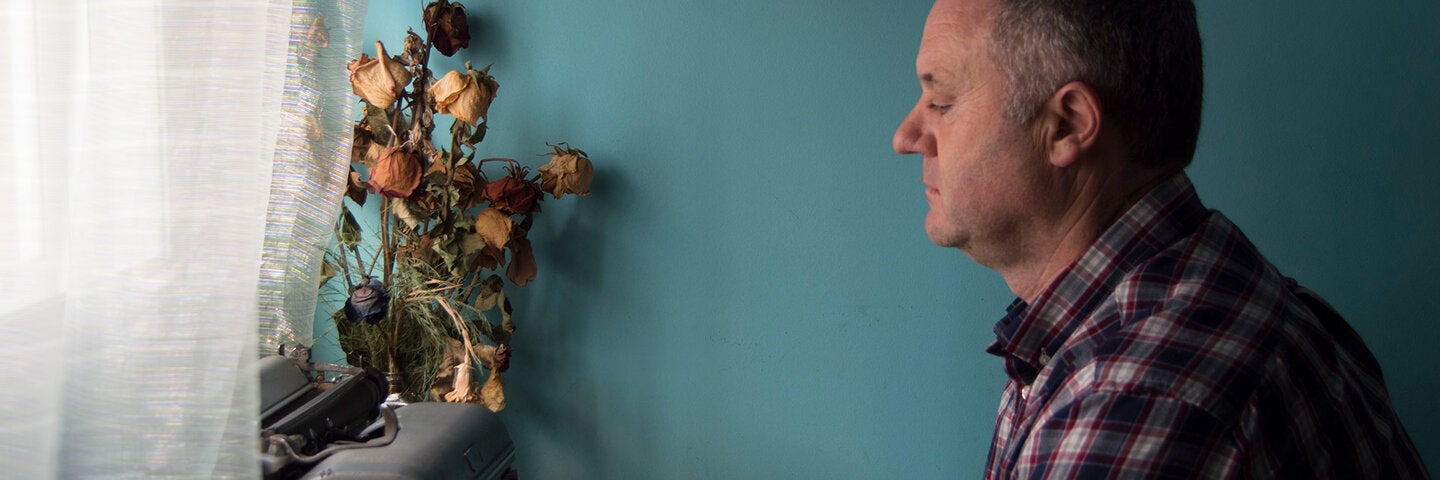 poet writing at his desk