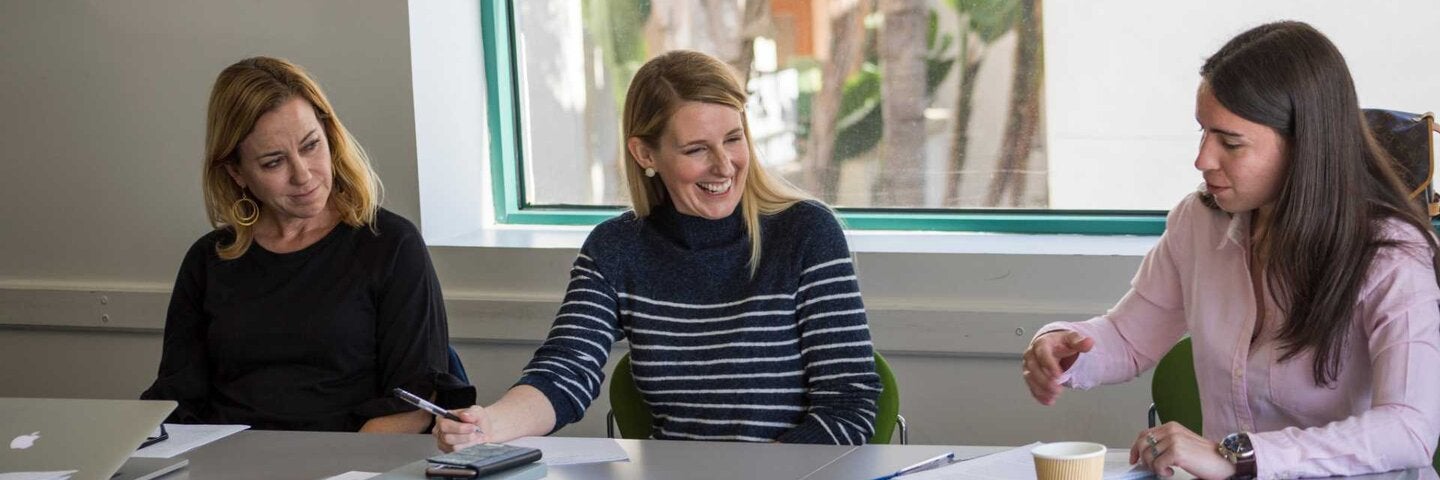 Writers in a classroom talking