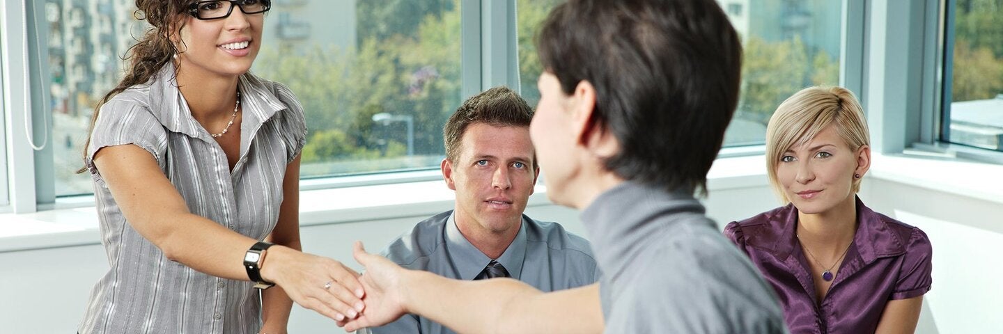 students shaking hands