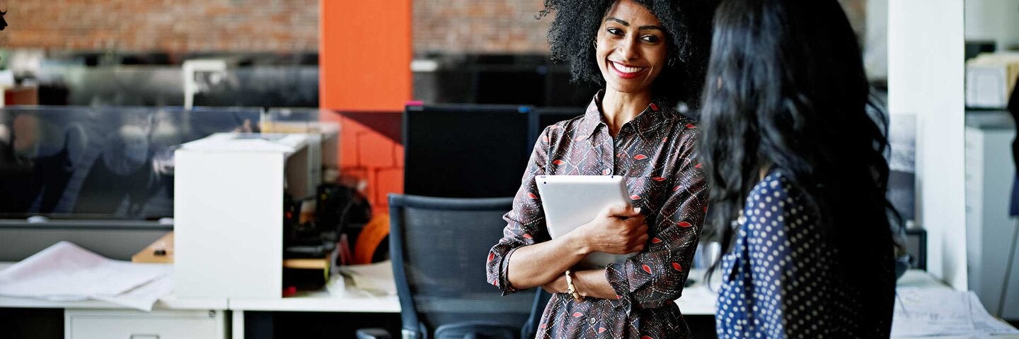 two women in conversation