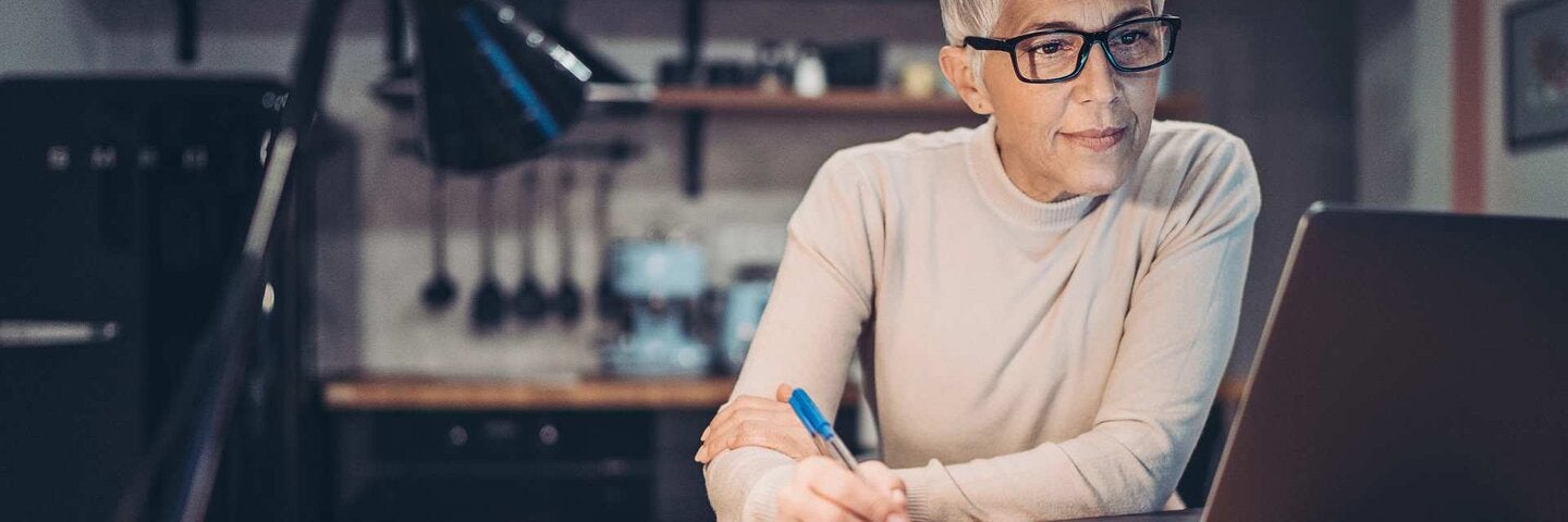 Mature woman working on writing project