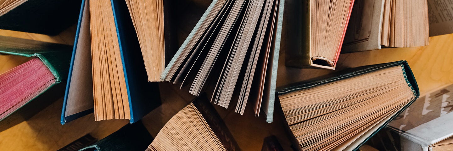 overhead view of books standing up on a table