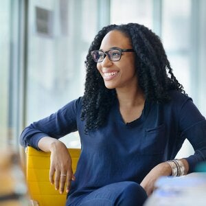 African American woman woman glasses smiling